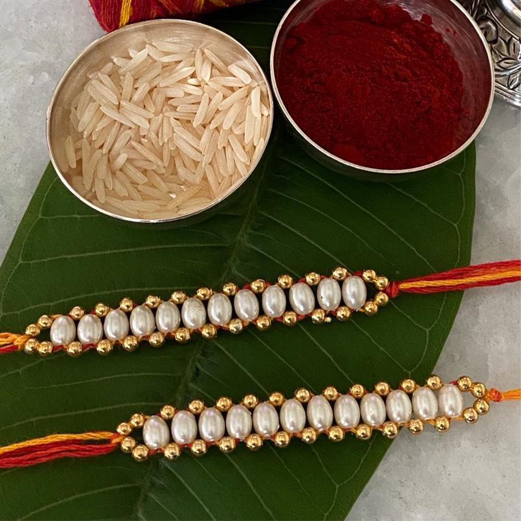 Premium Board Pearl With Golden Beads Rakhi Moli - 1 Set